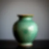 Elegant greenware ceramic vessel showcasing intricate designs