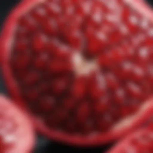 A close-up view of a pomegranate with its vibrant red seeds visible.