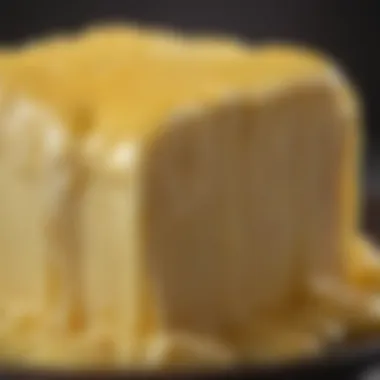 A close-up view of cow ghee highlighting its creamy texture