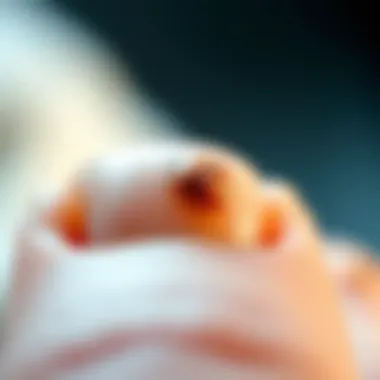 Close-up of pitted fingernails highlighting texture and condition